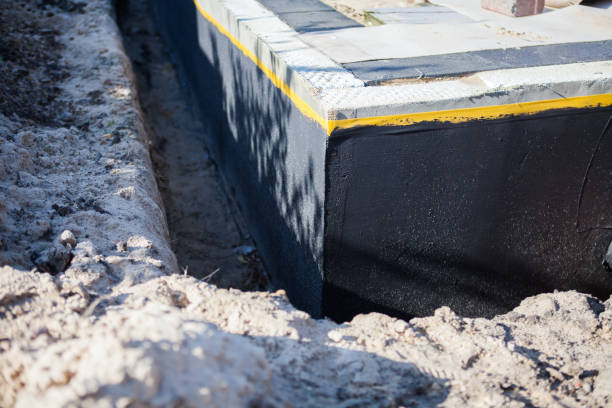 Professional Basement Waterproofing technician working in Darlington, IN